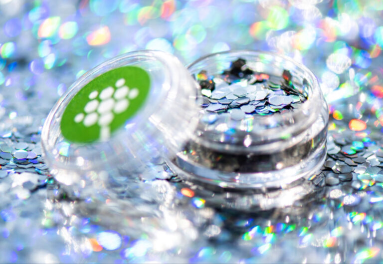 Holographic biodegradable cosmetic glitter in a pot