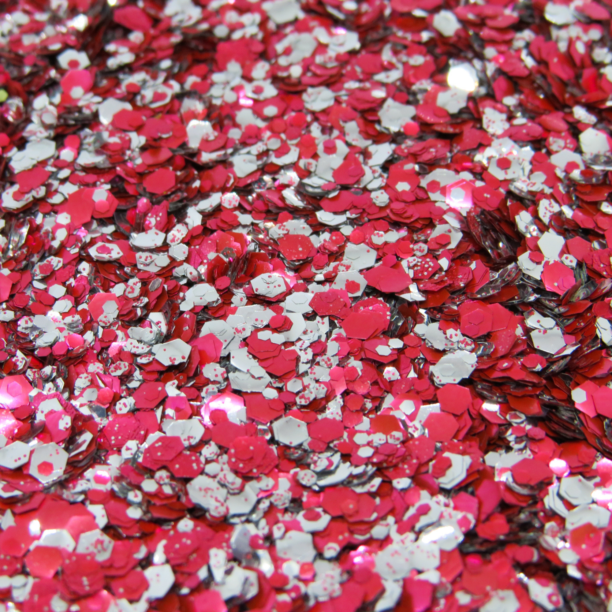 Red and silver mix of fine, chunky and ultra chunky glitter by Luminosity Glitter for Christmas