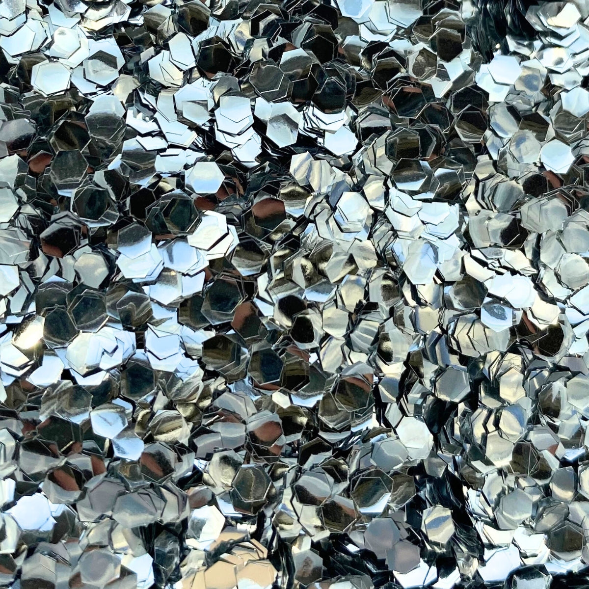 Festival glitter - silver super chunky for use on your face, body, hair and nails.