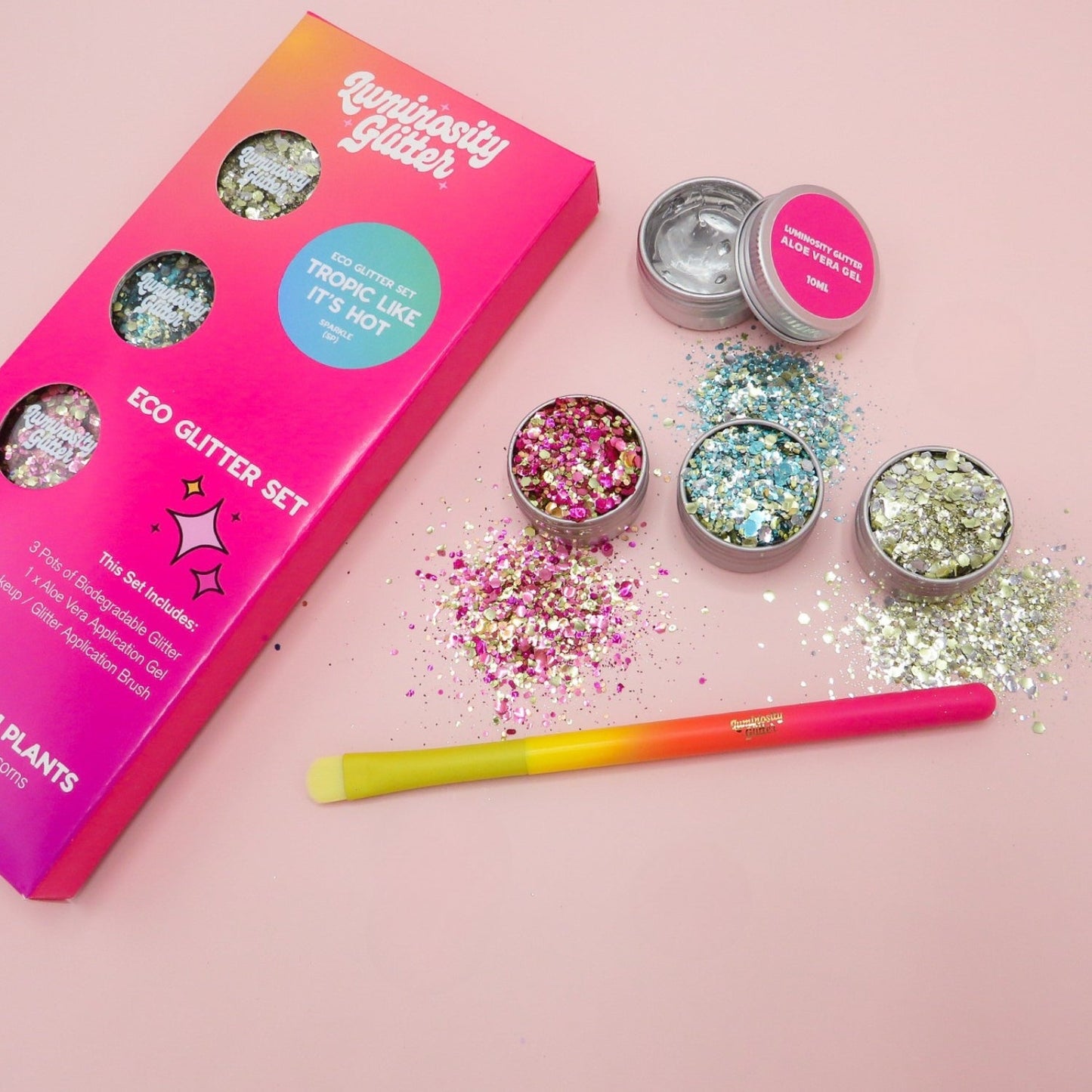 Festival glitter set - tropic like it's hot by Luminosity Glitter has three biodegradable glitter blends, an aloe vera application gel and makeup brush.