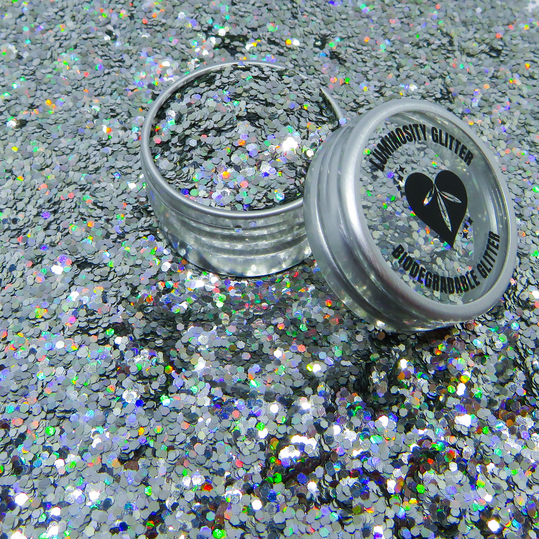 Silver holographic biodegradable glitter for festivals and makeup by Luminosity Glitter