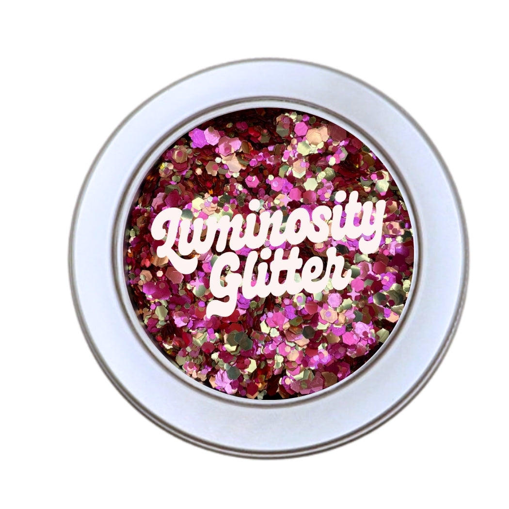 30 grams of Diva eco friendly glitter blend. Pink, orange and gold biodegradable glitter blend.