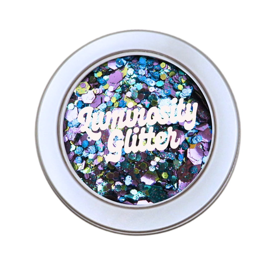 30 grams bulk glitter peacock blend of purple, blue, gold and turquoise glitter.