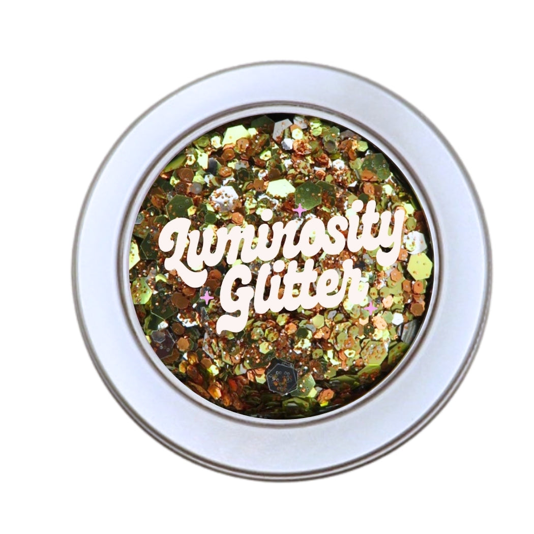 Bulk eco glitter by Luminosity Glitter. Sunset shimmer has been made with orange, gold and silver biodegradable glitter made from plants.