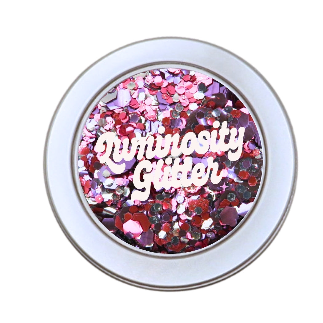 30 gram pink and purple biodegradable glitter blend by Luminosity Glitter. Bulk glitter in a round, window lid aluminium pot.