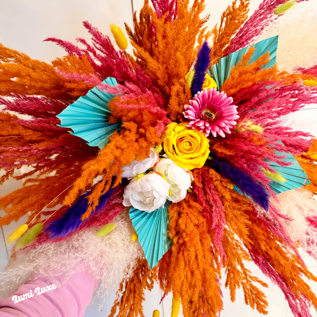 Bright pampas cloud to hire in orange, pink and turquoise. 