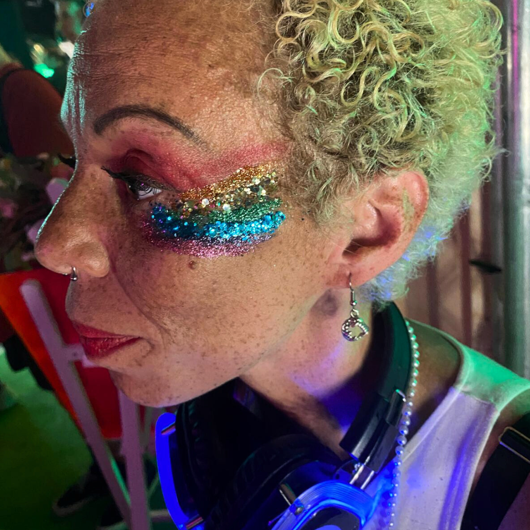 A rainbow glitter face in London
