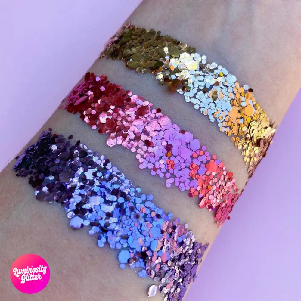 glitter swatch of the daydream eco glitter set with rose gold, rose pink and purple glitter blends.