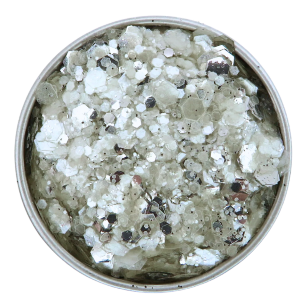 Close up of arctic blast halloween glitter which is a clear frosty shade and silver shade. A mix of three sizes of biodegradable glitter.