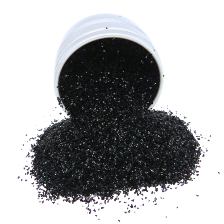 Black medium eco friendly glitter pouring out of a 6 gram aluminium pot.