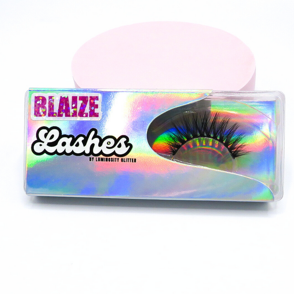 Full strip lashes by Luminosity Glitter. Blaize lashes are medium lash for a bold look with a winged eyeliner.