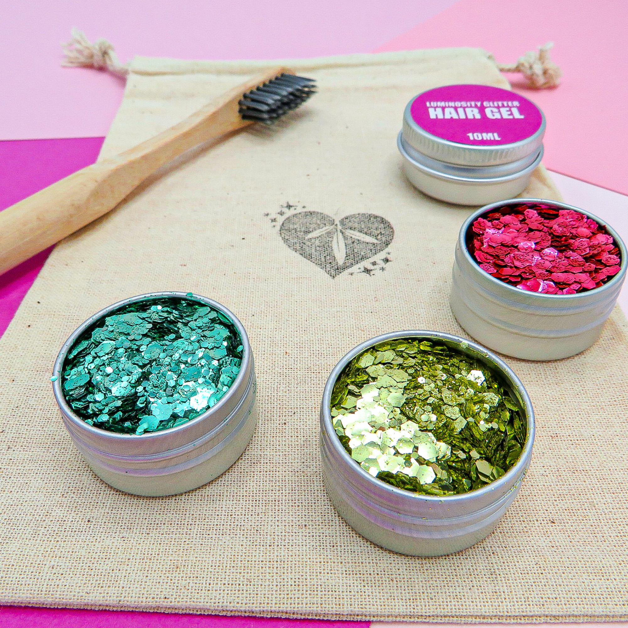 Christmas eco glitter beard set by Luminosity Glitter includes pots of red, gold and green glitter, a bamboo application brush and pot of vegan hair gel.