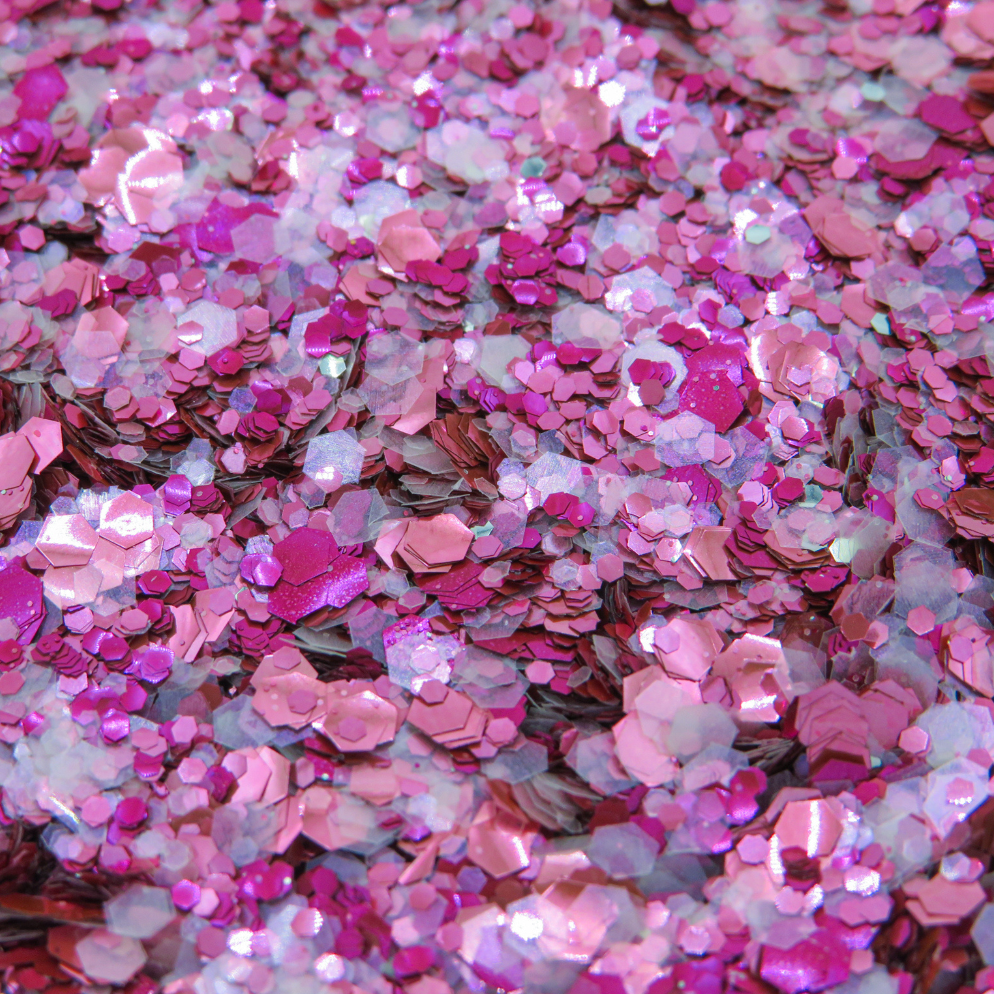 An eco glitter mix made with pink, magenta and opal rose bioglitters