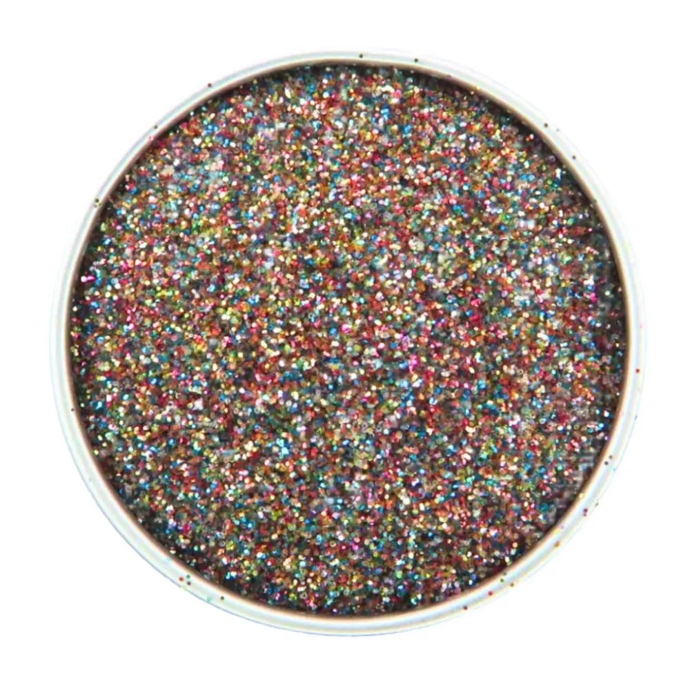 Close up of fairy dust eco friendly glitter mix for glittering your face, body, hair, nails, eyes and more. A rainbow fine glitter mix.