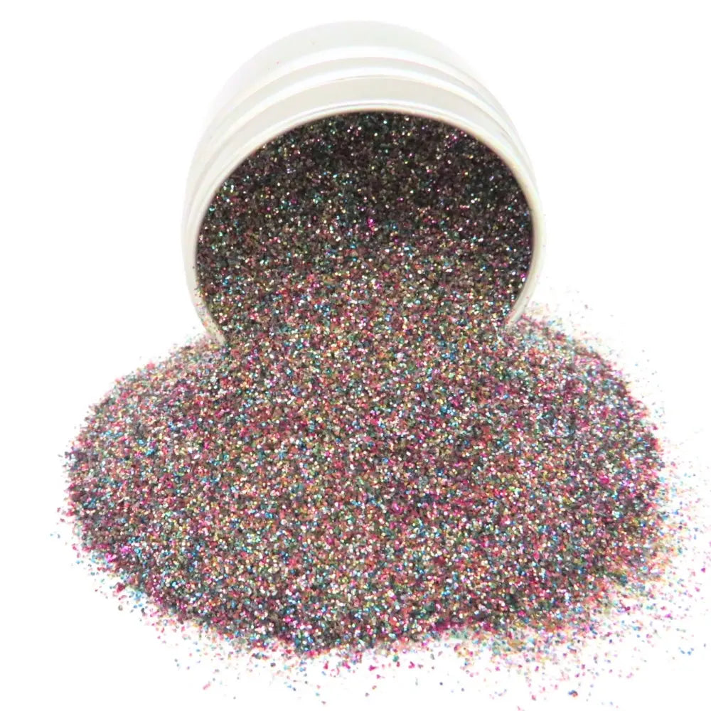 Fairy dust biodegradable glitter makeup pouring out of a 6 gram aluminium tin.