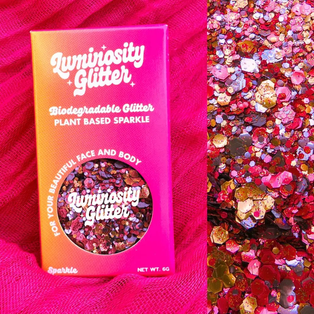 Firecracker eco glitter blend of red, purple and orange eco friendly glitter flakes in fine, chunky and super chunky sizing. This glitter is boxed in a bright ombre packaging box that is fully recyclable.