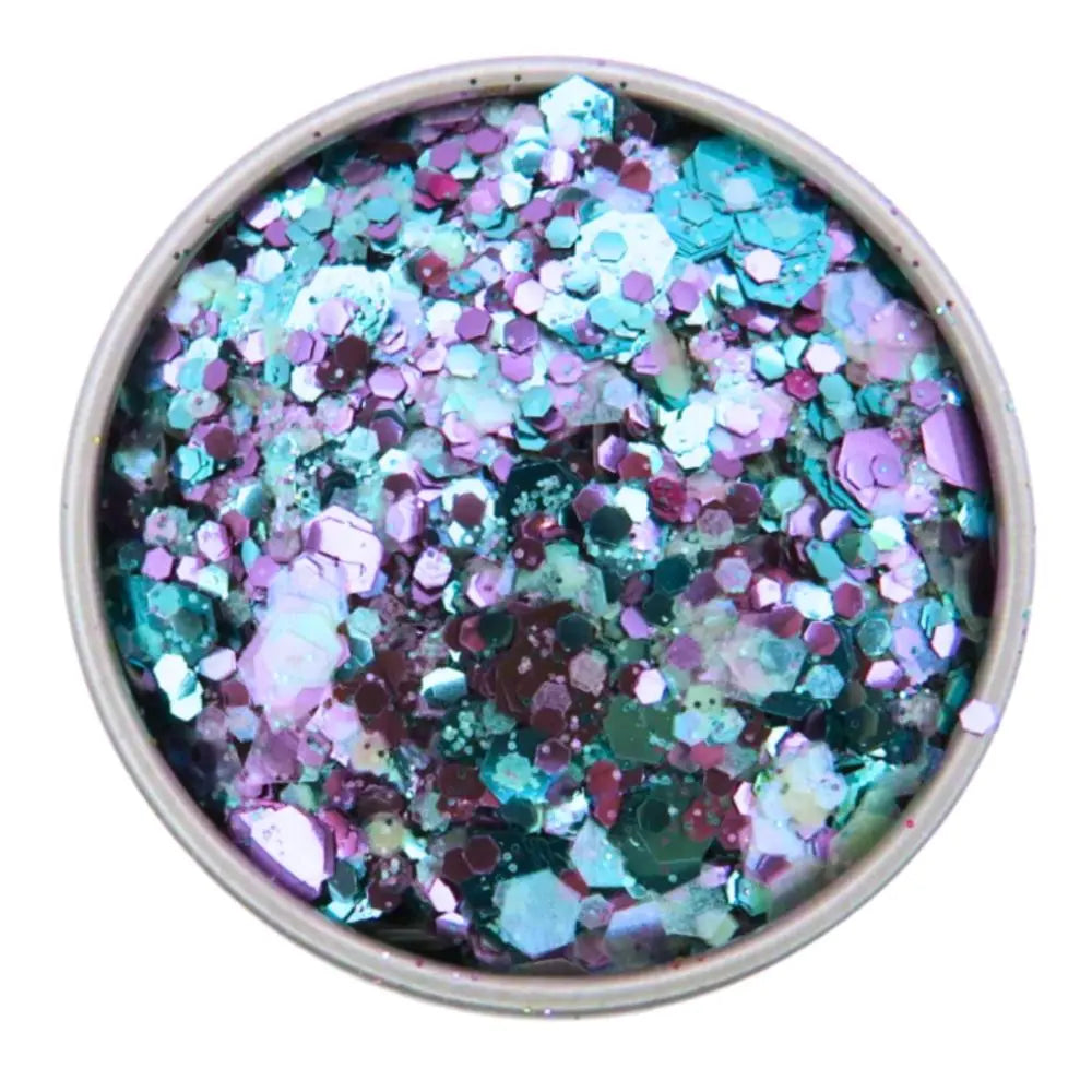 Galaxy glitter blend. A close up image of the mix which is made with turquoise, purple and opalescent mix of pink, blue and green in fine, chunky and super chunky sizing.