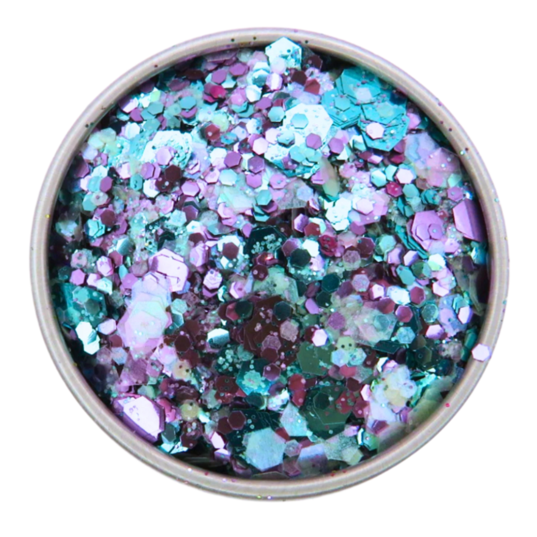 Galaxy glitter blend. A close up image of the mix which is made with turquoise, purple and opalescent mix of pink, blue and green in fine, chunky and super chunky sizing.