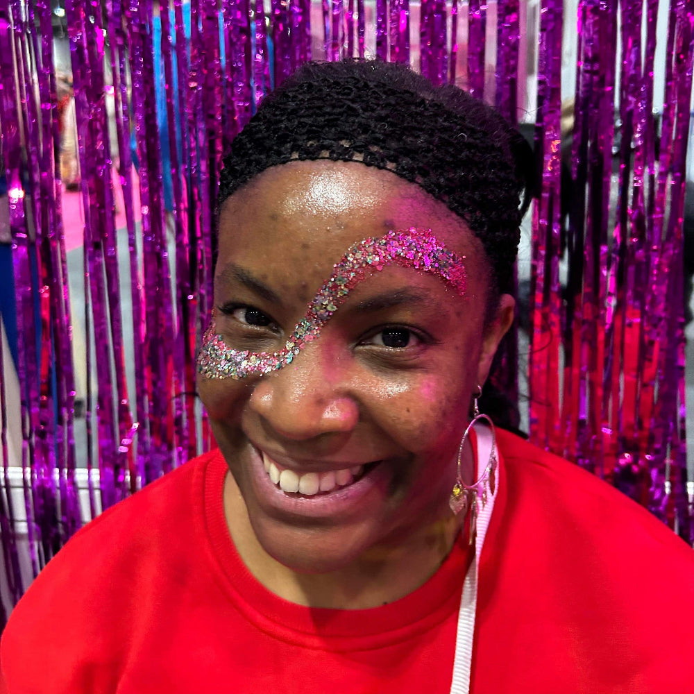 Glitter face makeup look at drag con uk