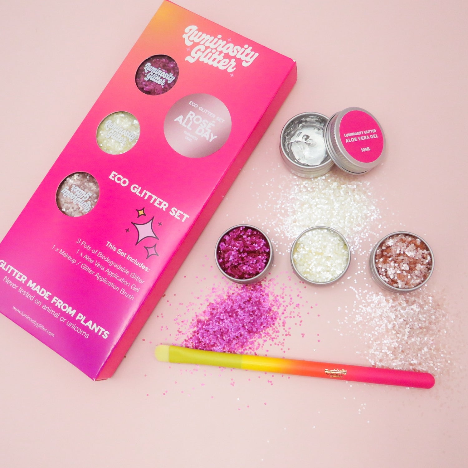 Rose All Day festival face and body glitter set with magenta, light pink and white eco friendly glitter in chunky size.
