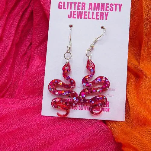 Pink glitter snake earrings