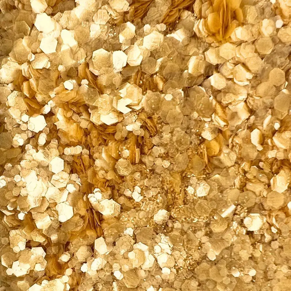 Honey Gold biodegradable glitter mix close up with fine, chunky and super chunky glitter in the mix.