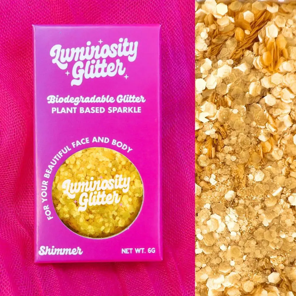 Honey gold biodegradable glitter in a 6 gram pot and ombre packaging box. Glitter for use on your face, body, hair and nails.