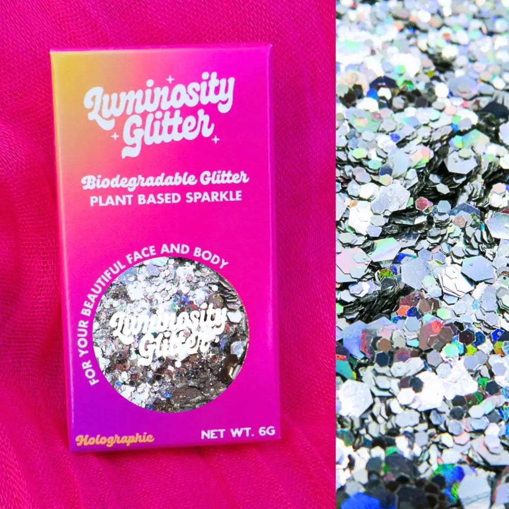 Kaleidoscope holographic eco friendly glitter mix in a pink, orange and purple ombre box that is recyclable.