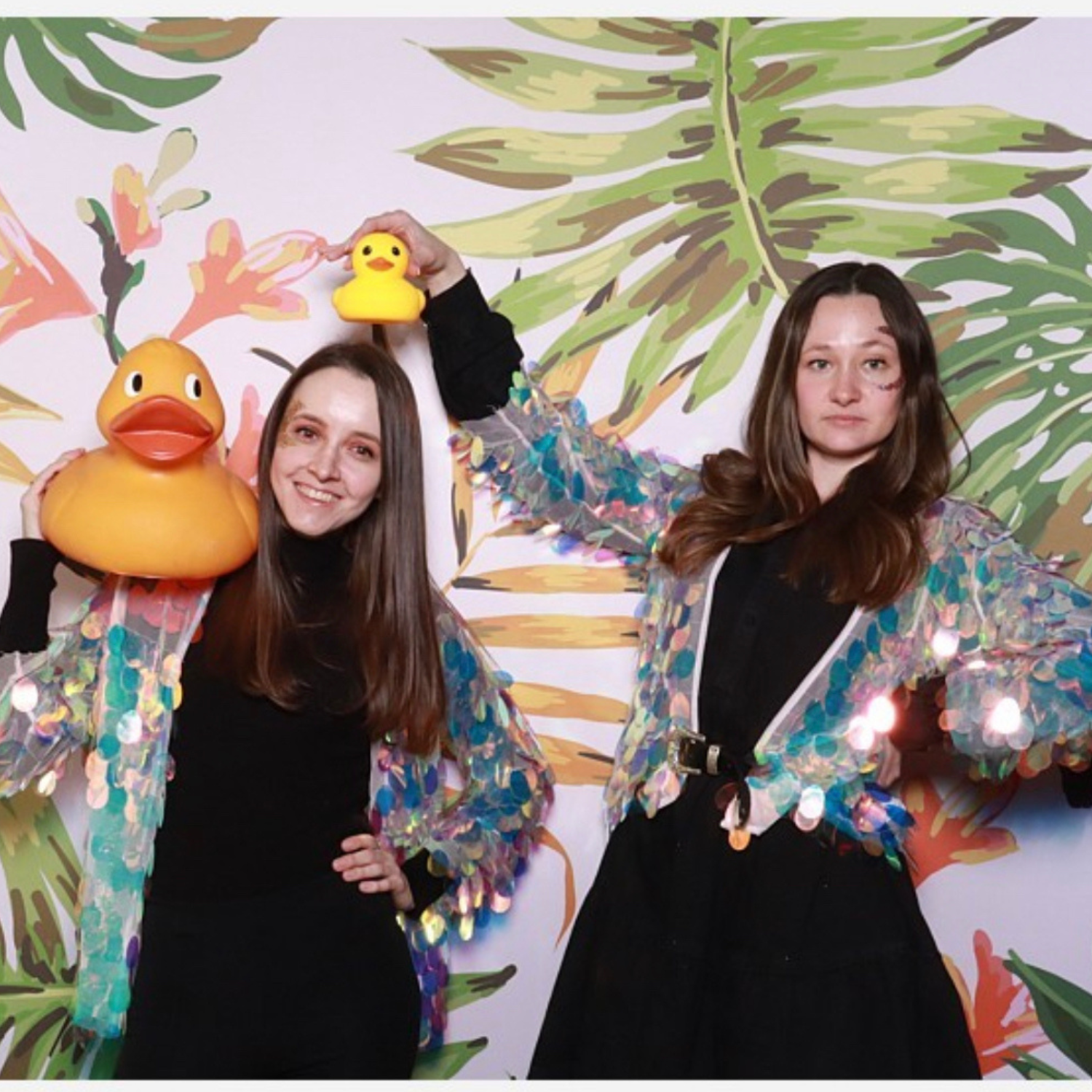 Luminosity Glitter artists posing in a Photo Booth at a corporate event in London with ducks