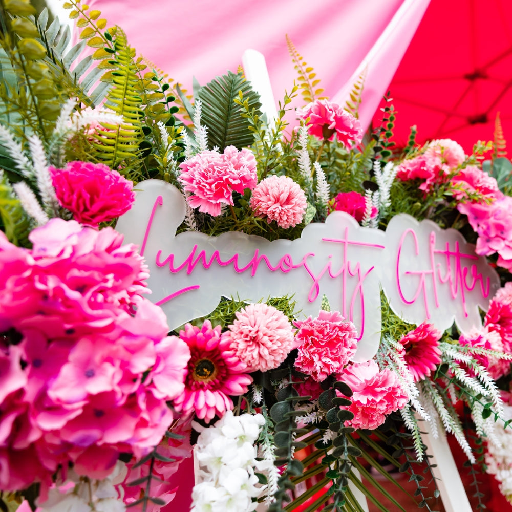 Luminosity Glitter pink floral sign.