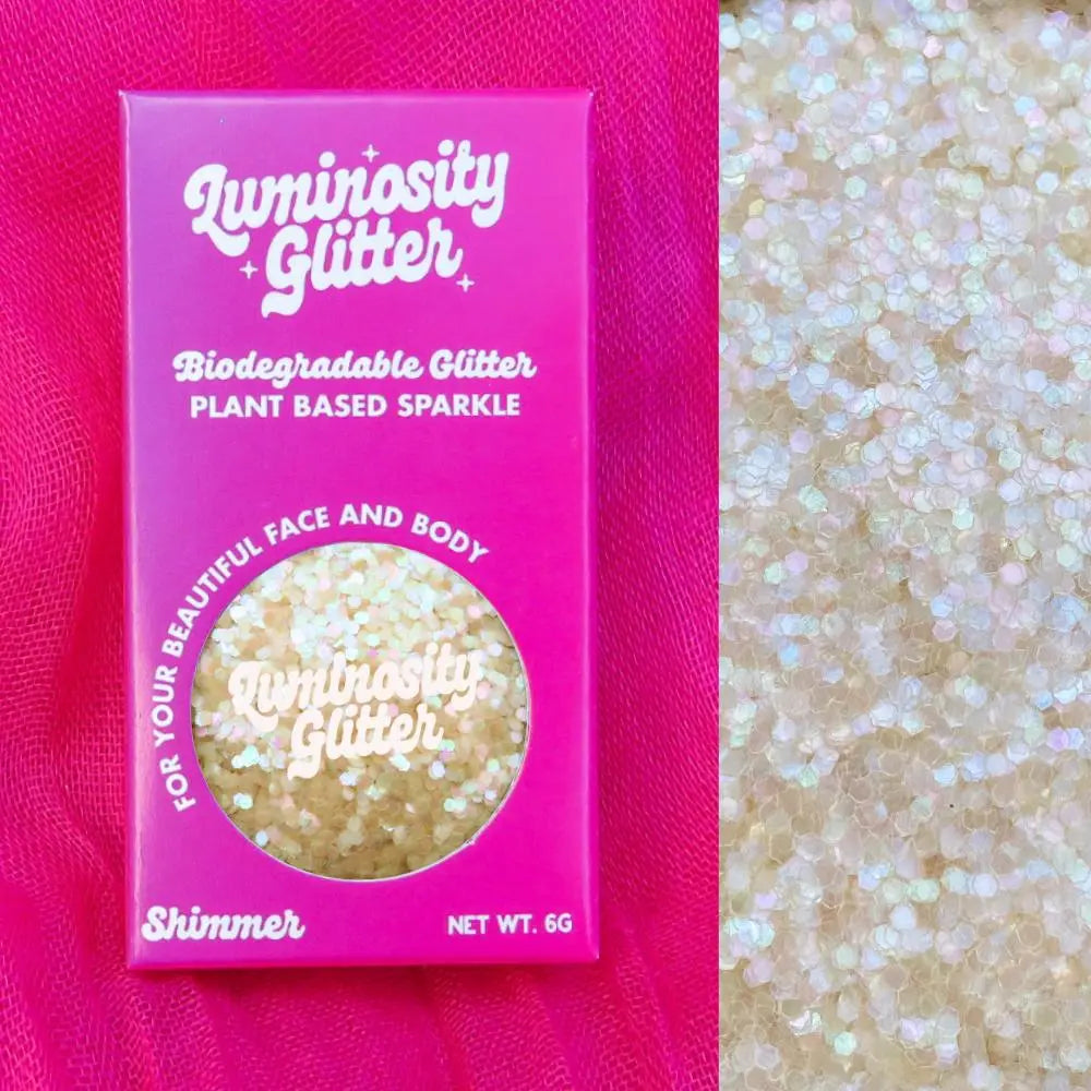 Luna biodegradable glitter chunky iridescent glitter in a 6gram aluminium pot and bright pink and purple ombre packaging box.