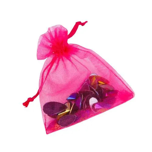 Maverick reusable festival face and body gems by Luminosity Glitter in a mini hot pink organza bag to keep them safe after use