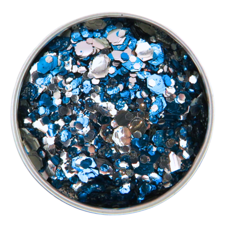 Moon river blend of silver and blue eco friendly glitter in a round aluminium tin for use on your face, body, hair and nails. 