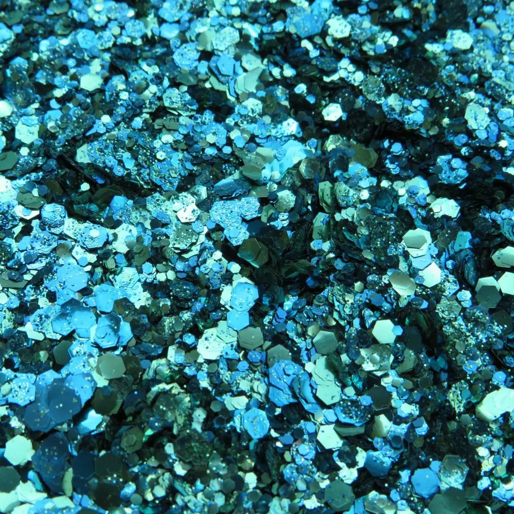 Ocean bioglitter mix of blue, green and turquoise glitter for use on your face, body, hair and nails.