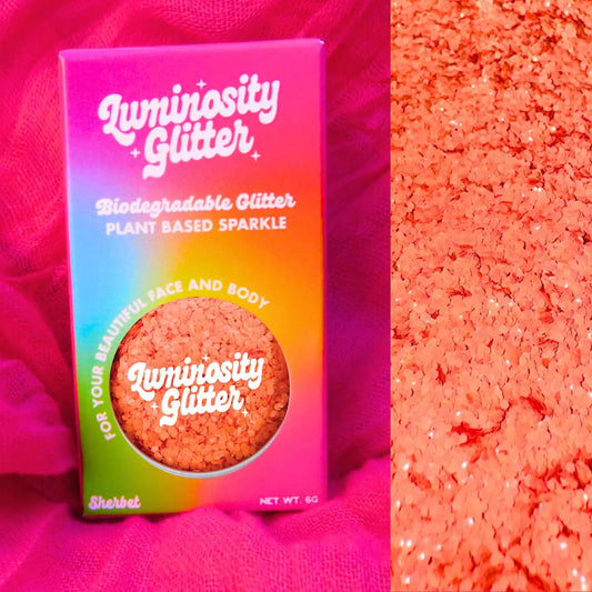 Peach electric sherbet chunky eco glitter in a bright neon shade of orange.