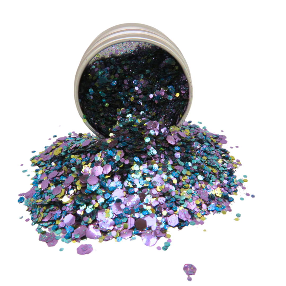 Peacock loose glitter makeup is a blend of purple, blue, gold and turquoise glitter in fine, chunky and super chunky.