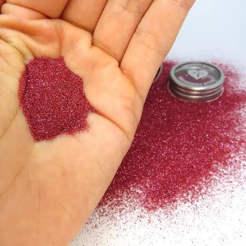 Pink fine bioglitter. Fine sized cosmetic glitter for glitter nails and makeup. Festival glitter in a light pink shade.