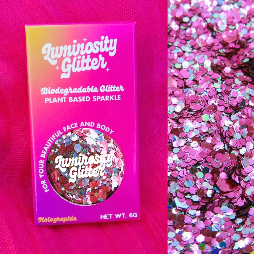 Pink flamingo holographic silver and pink eco glitter in a bright pink, purple and orange ombre gift box.