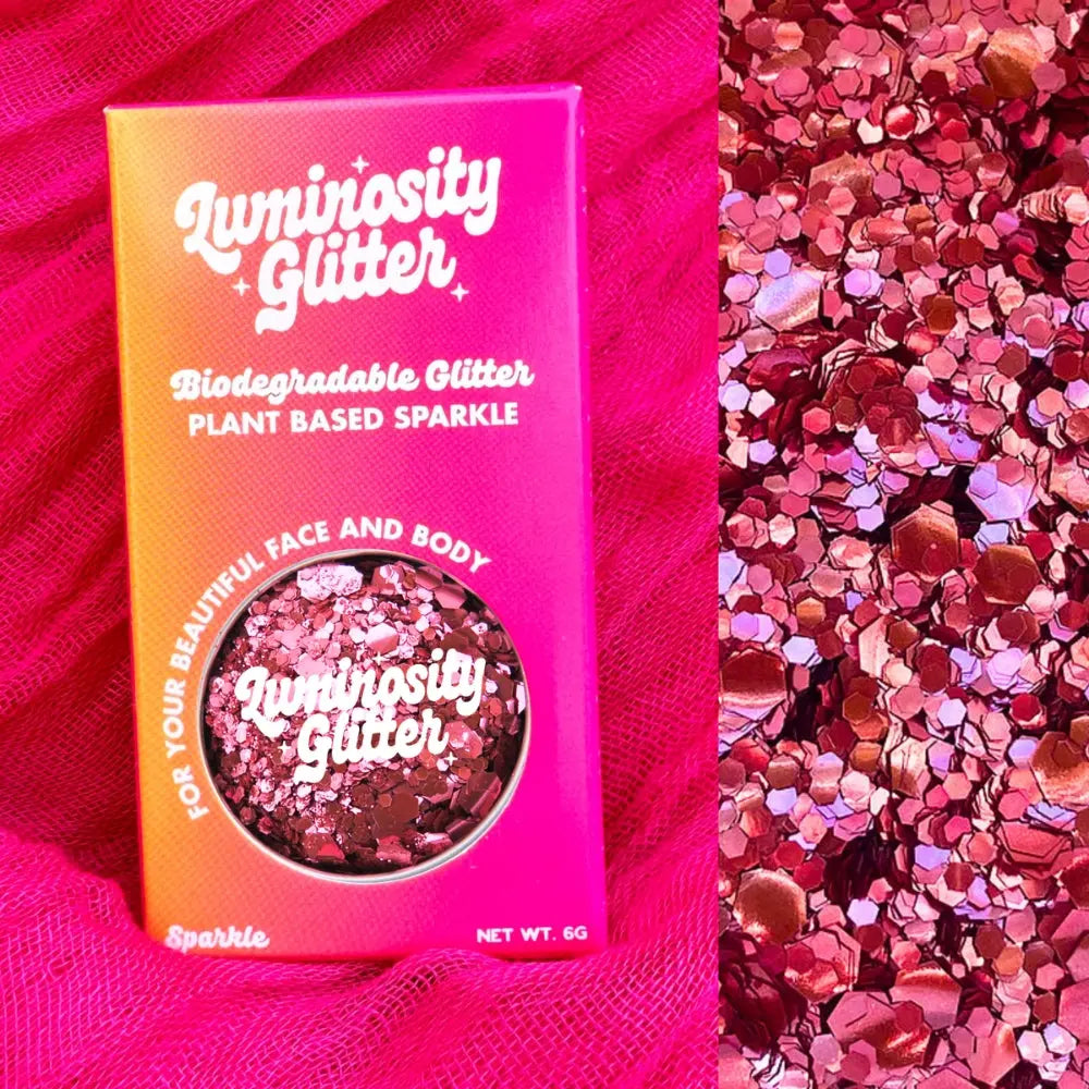 Rose pink biodegradable glitter in a bright pink and orange ombre box for gifting and stocking filler gifts.