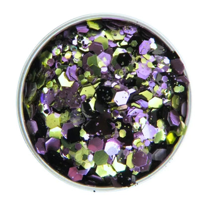 Close up of purple starlight eco glitter blend. A mix of black, purple, gold and pink opalescent eco friendly glitter.