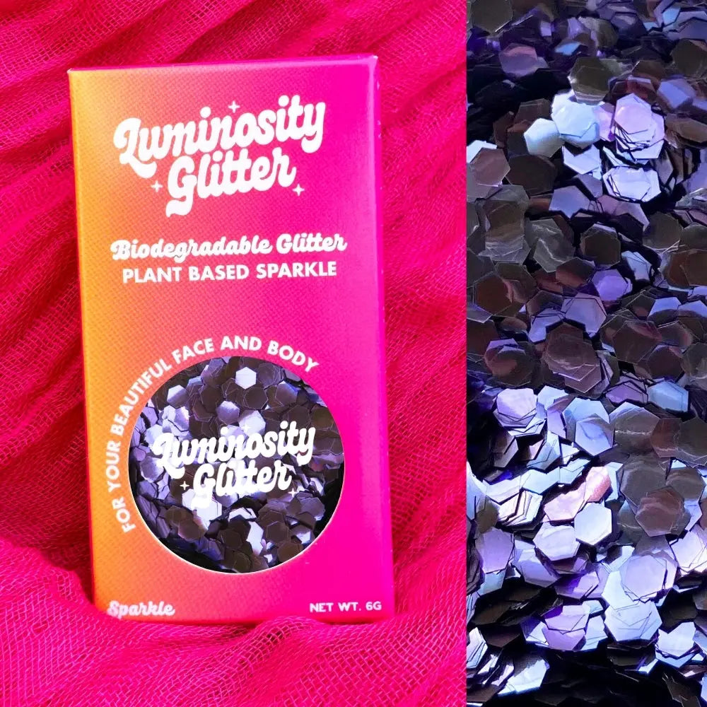 Purple super chunky bioglitter makeup for use on your face, body, hair and nails. Festival glitter makeup in a bold purple shade.