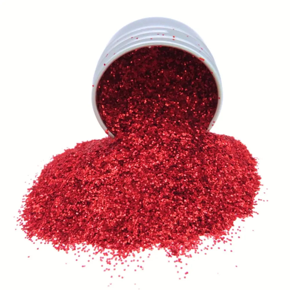 A 6 gram pot of medium eco friendly glitter in a bright ruby red shade.