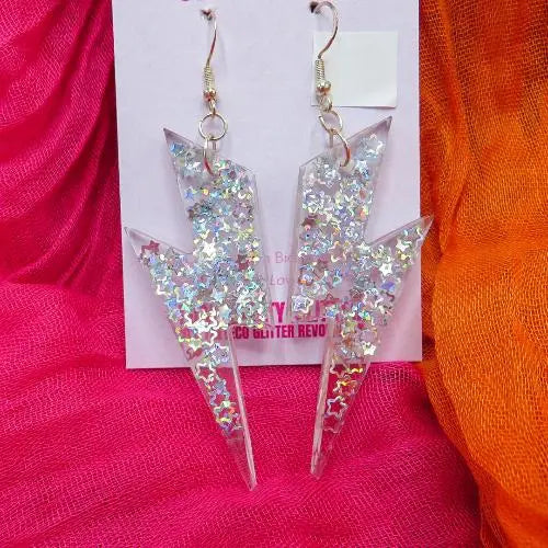 Silver holographic stars in lightning bolt earrings