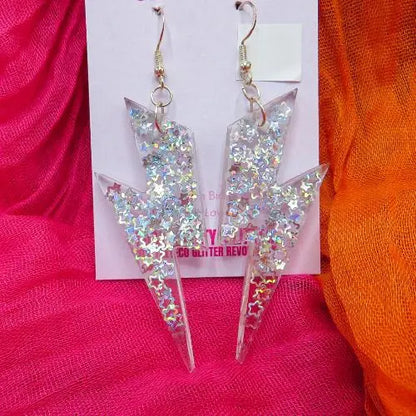 Silver holographic stars in lightning bolt earrings