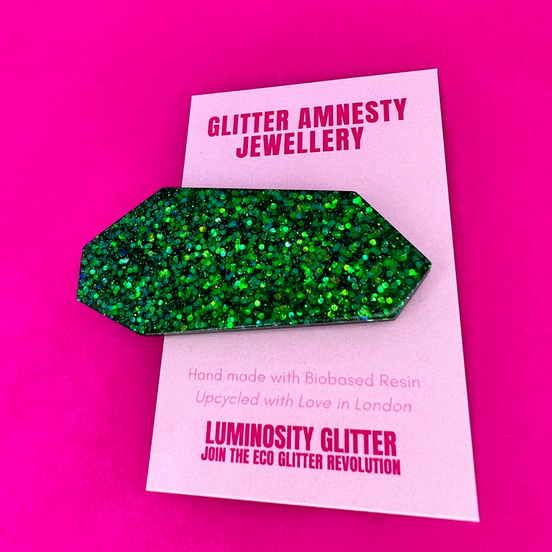 A single green glitter hair clip by Luminosity Glitter