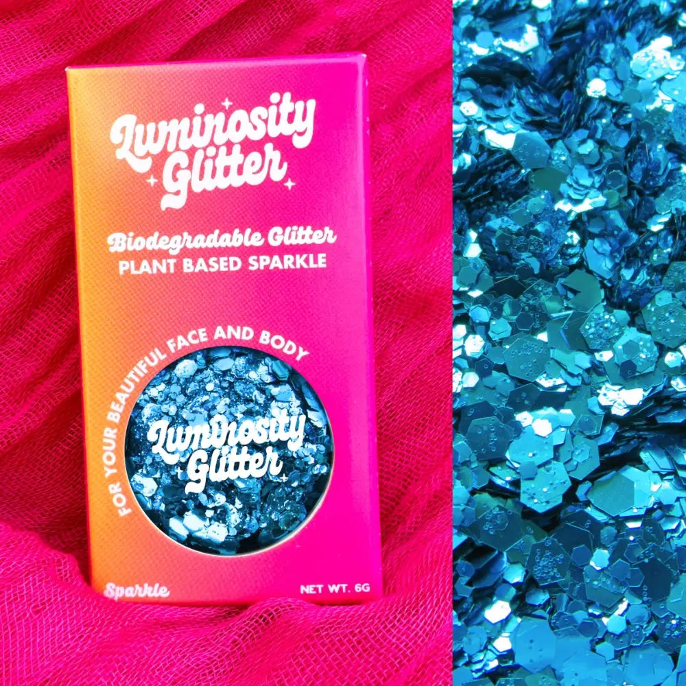 Sky blue eco friendly cosmetic grade glitter in a bold pink and orange recyclable box.