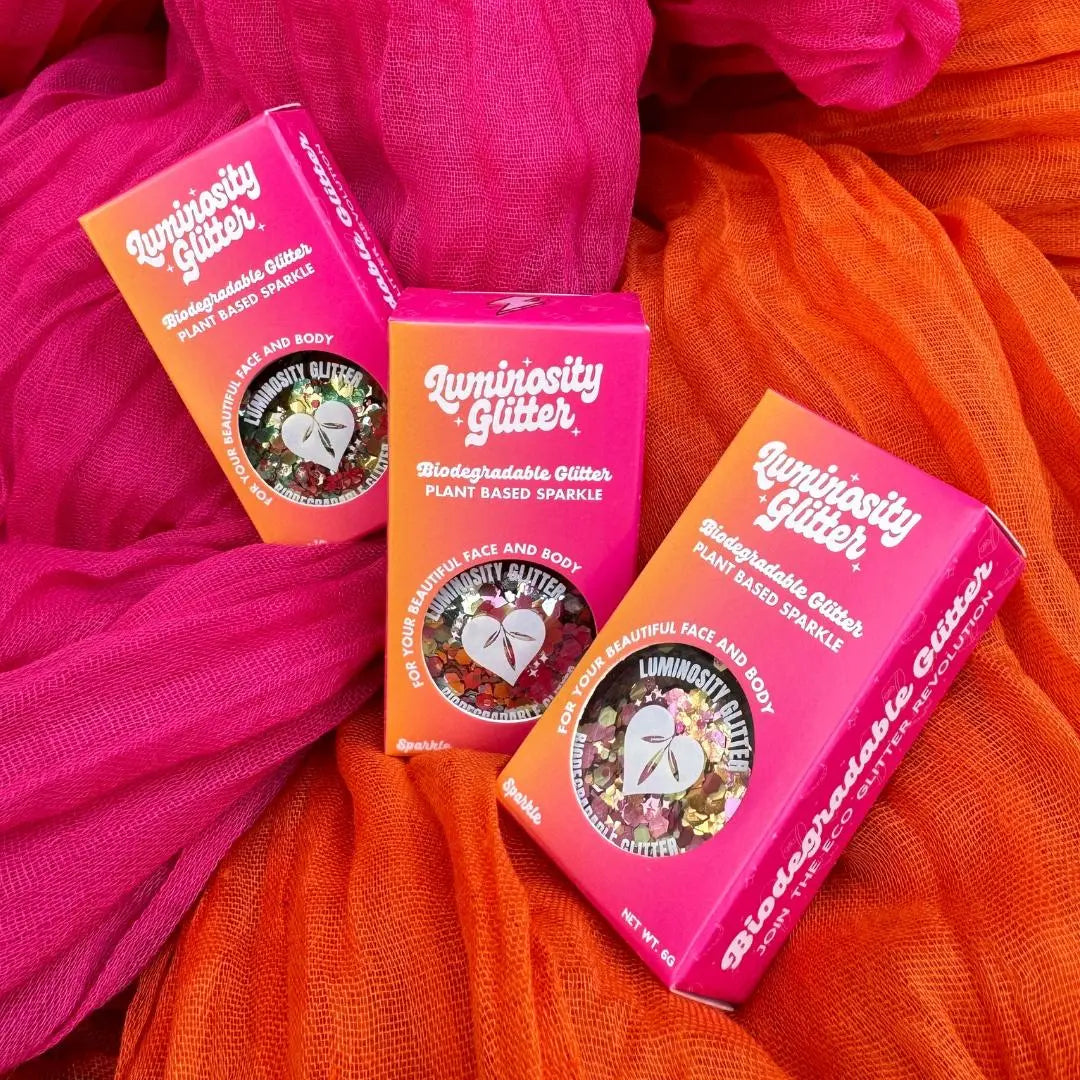 Bioglitter Sparkle blends in pots in ombre pink and orange packaging