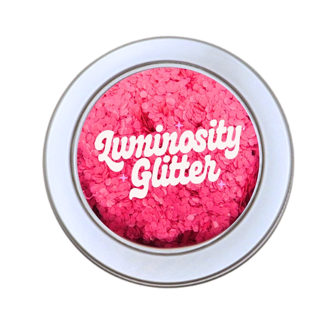 Strawberry pink chunky opaque bioglitter in a round aluminium pot with a window lid. 30 grams of eco friendly glitter.