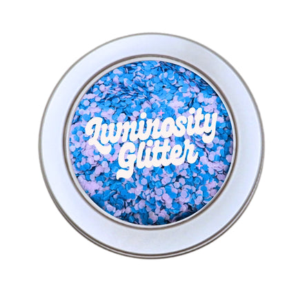 Tranquility blend of blue and purple opaque biodegradable glitter in a 30 gram aluminium pot.