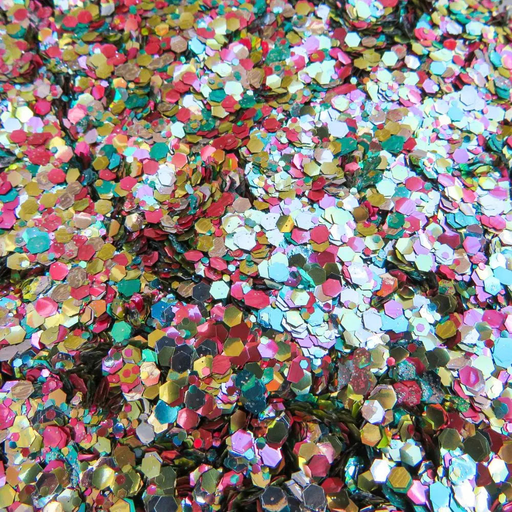 Close up of tropicana eco glitter mix with silver, gold, turquoise and pink glitter shades.